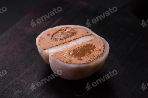 Preview: Delicious sweet mochi dessert with toppings on a dark concrete background