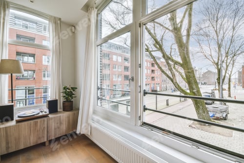 Preview: A pair of large windows in the spacious living room