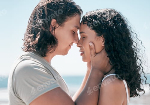 Preview: Love, hands on face and couple relax at a beach, in love and romantic on blue sky background. Intim