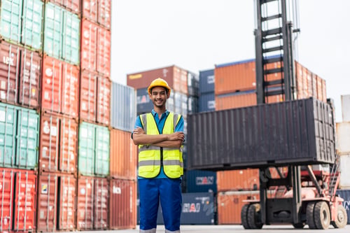 Preview: Portrait of Asian man engineer worker work in container port terminal.