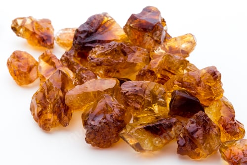 Preview: Brown caramelized sugar on white background.