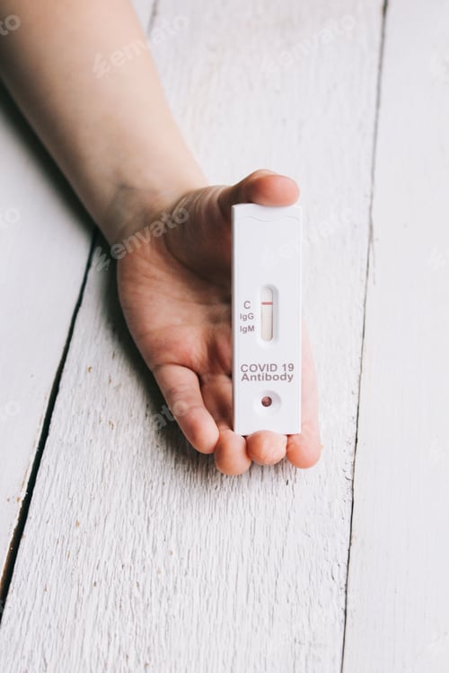 Preview: hand with a negative rapid test for covid