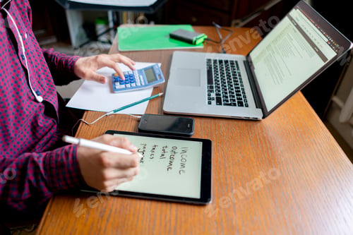 Preview: top view of person starting new business plan at home b