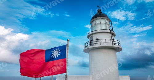 Preview: Lighthouse and Flag Against Bright Blue Sky