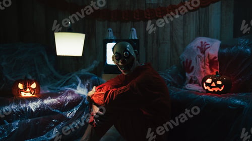 Preview: Halloween Party Room With Costumed Clown and Pumpkins