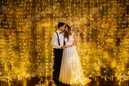Preview: Couple kissing on their wedding day