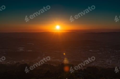 Preview: Sunset with sun rays over the Guimaraes