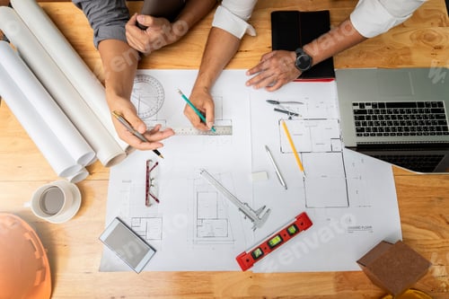 Preview: Confident team of architect working together in a office. They discussing about new startup project.