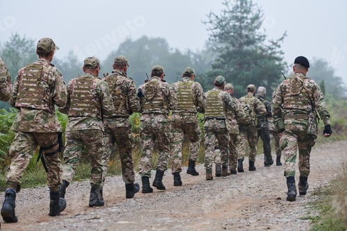 Preview: An elite military unit, led by a major, confidently parades through dense forest, showcasing