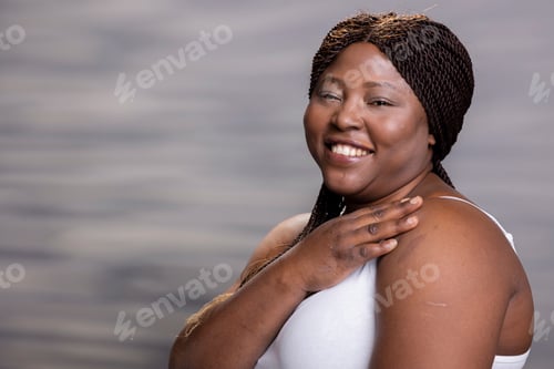 Preview: Portrait of african american happy girl with candid smile and soft skin