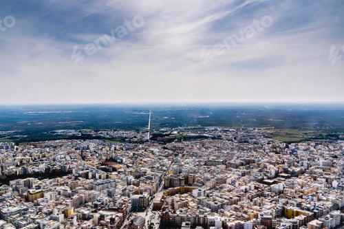 Preview: Bitonto, Italy - March 8, 2019: Aerial view, in a plane, of the Italian city of Bitonto.