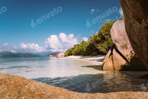 Preview: La Digue, Seychelles, Anse Source d'Argent beach in morning warm light. World known famous