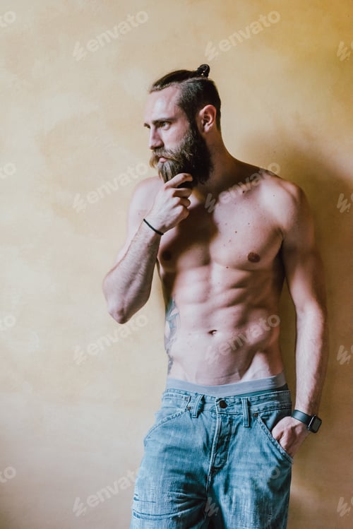 Preview: young bearded man bare chested