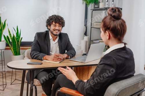 Preview: Successful business people working in modern office