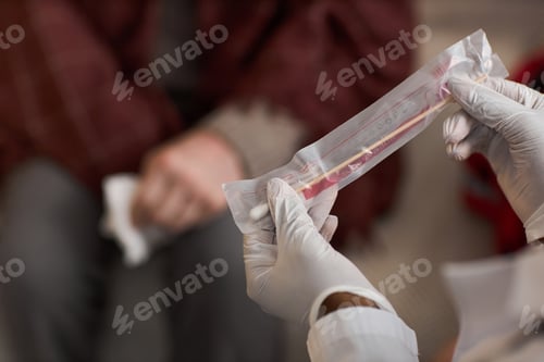 Preview: Senior Man Receiving Medical Swab Test from Healthcare Worker
