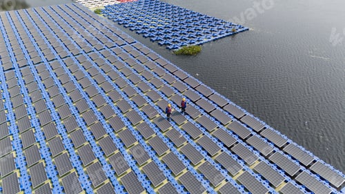 Preview: Renewable Energy Eco Technology Electric Power. Floating solar panels on lake.
