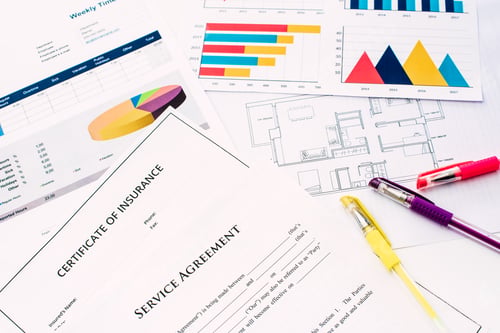 Preview: Plans and financial documents with costs, in the real state business.