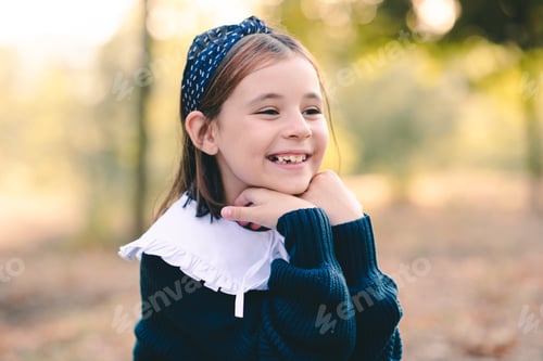 Preview: Happy pupil kid girl outdoor close up.