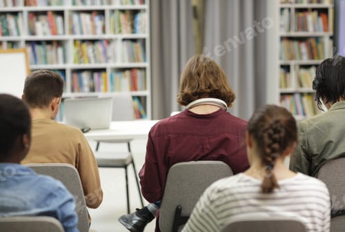 Preview: People sitting at the library