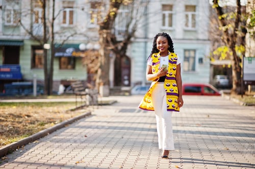 Preview: African woman in yellow