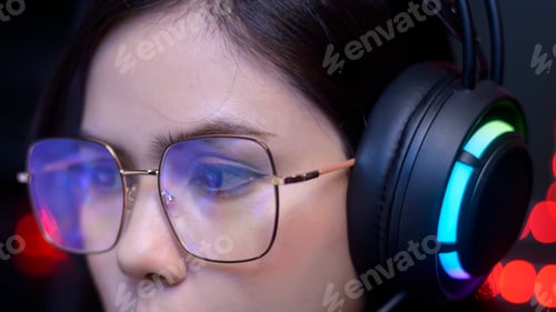 Preview: Professional Streamer and gamer wearing glasses playing online video games