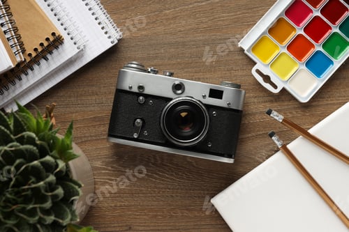Preview: Concept of leisure and photo hobby with retro photo camera