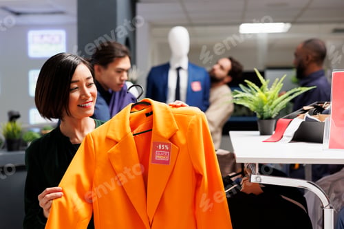 Preview: Woman happy with Black Friday purchase
