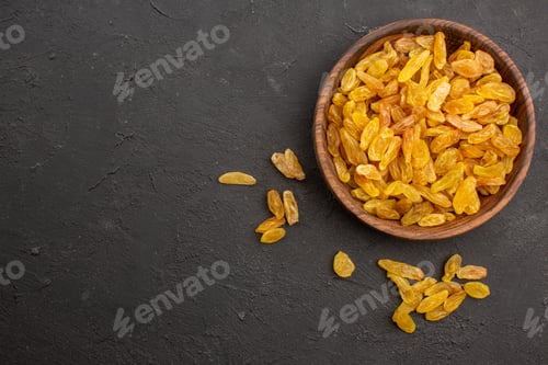 Preview: top view dried grape raisins inside plate on the grey background dry raisin fruit