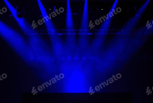 Preview: Blue stage lights. Space for text