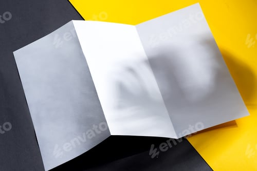 Preview: Minimal trifold brochure template above duotone background with shadows