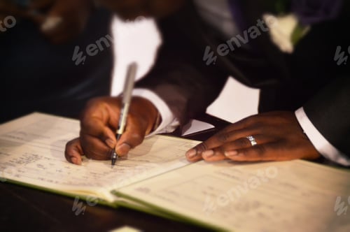 Preview: Groom signing the marriage registration book
