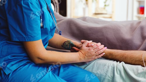 Vista previa: Close up shot of nurse taking old man hands