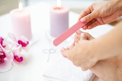 Preview: Woman Doing Pedicure Caring For Fingernails At Home