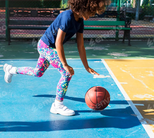 Preview: African child playing basketball