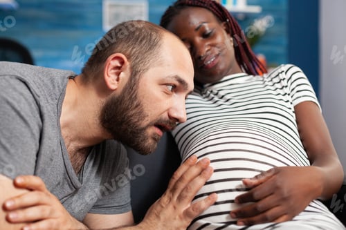 Preview: Close up of future father feeling unborn babychild
