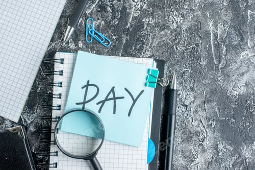 Preview: top view day written note with copybook and pen on gray background team color job office college