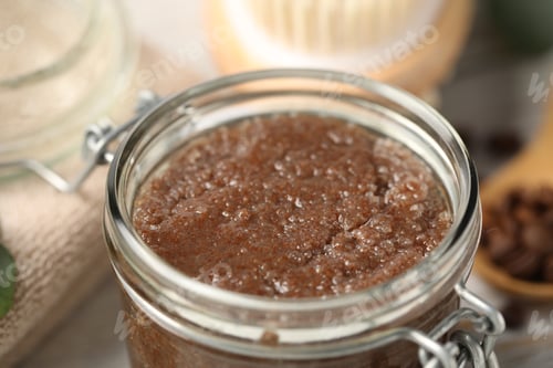 Preview: Natural body scrub in glass jar on table, closeup