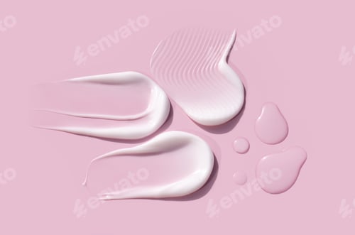 Preview: cosmetic smears cream texture on a light pink background