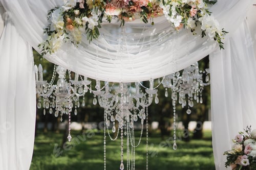 Preview: Lounge zone and European traditional wedding ceremony decoration outdoors before the reception.