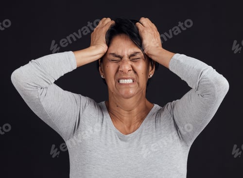 Preview: Anger, anxiety and senior woman screaming, depression and mental health issue on a dark studio back