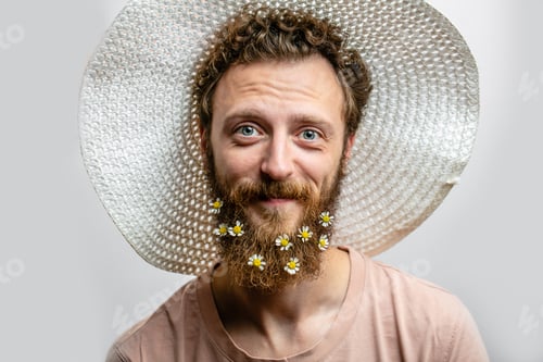 Preview: Satisfied cheerful handsome man smiles at camera isolated over white background.