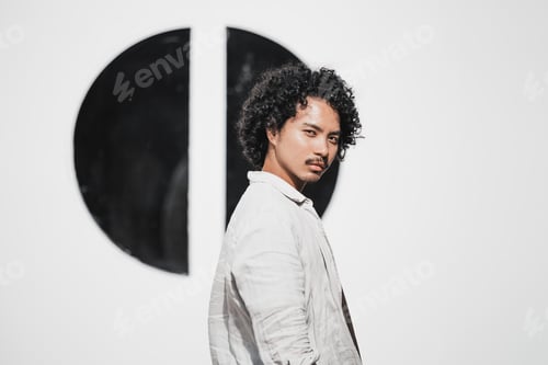 Preview: Young mixed guy in a white shirt