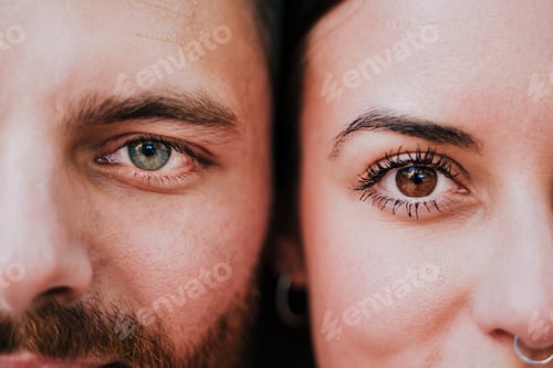 Preview: close up view of young happy couple together. Eyes close up. Love and family concept