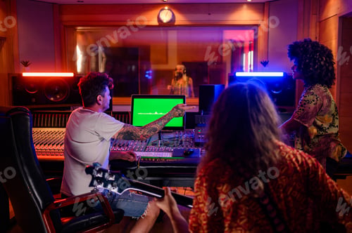 Preview: Diverse musicians and producer making music at recording studio.