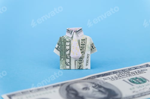 Preview: One hundred dollar bill folded in the shape of a man's jacket with a tie and free space for text