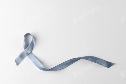 Preview: Composition of grey ribbon for cancer awareness, on white background with copy space
