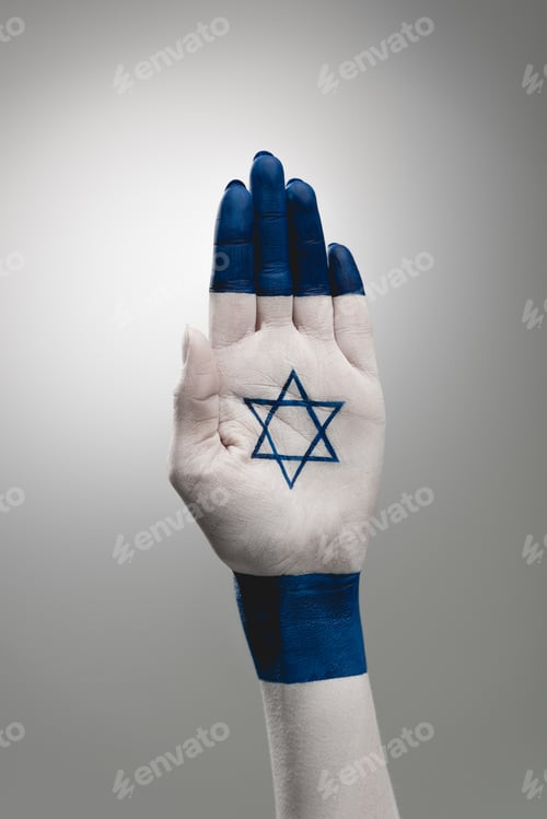 Preview: cropped view of female hand with star of david on grey