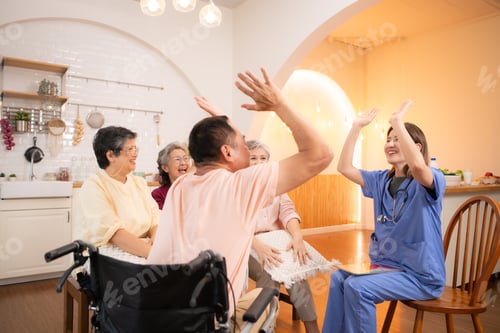 Preview: Group of elderly and senior man in wheelchair with nurse at nursing home