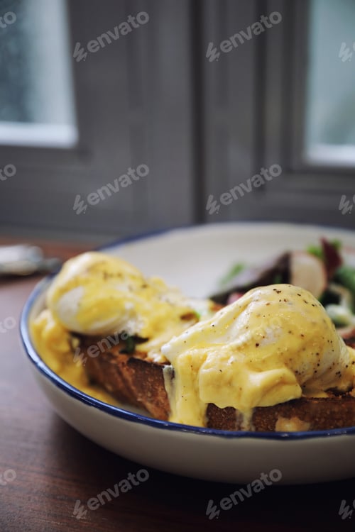 Preview: Egg Benedict , Poached Eggs With Toast On Wood Background , English Breakfast