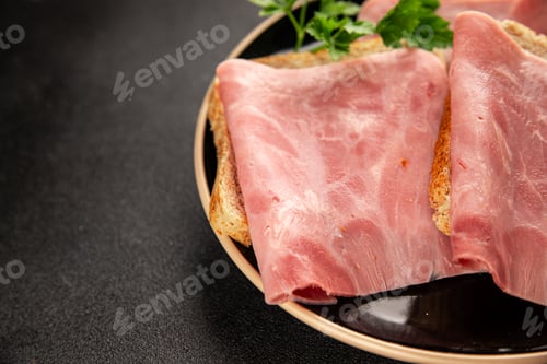 Preview: Ham slices meat spam pork fresh delicious gourmet food background on the table